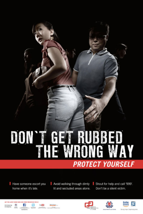 Singapore Police Force (SPF) poster depicting a woman who's on the verge of being molested by a male criminal